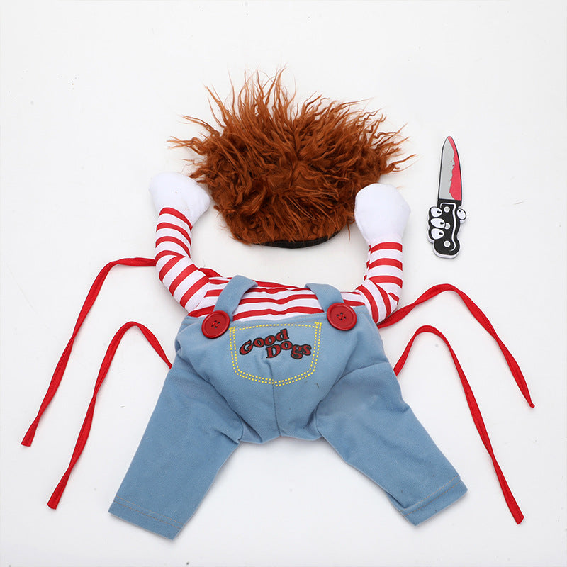 Flat-lay of the costume pieces: wig hood, striped arms, blue overalls, toy knife