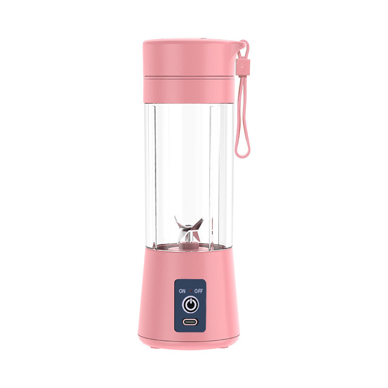 Pastel pink portable blender with clear cup and power button