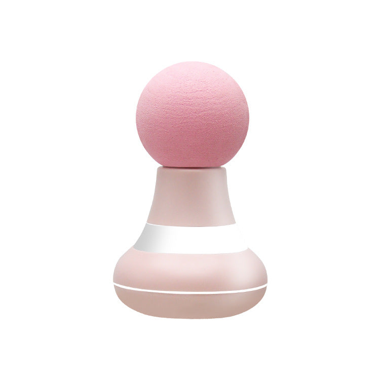 Pink and rose-gold mini massager with round foam head, front view